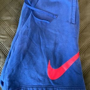 Nike Men’s Blue Fleece Bottoms with Red Swoosh